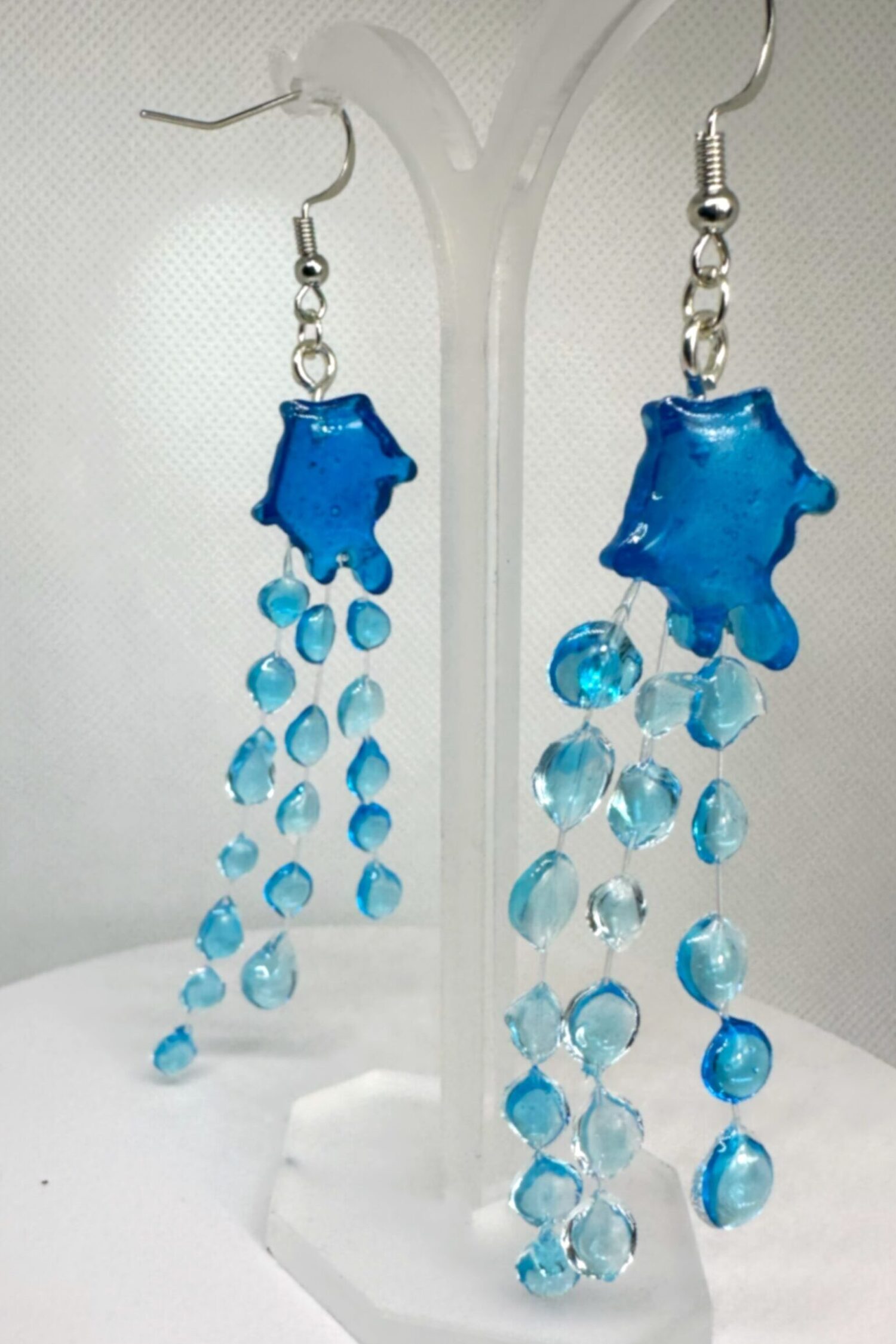 Handmade blue resin rain-drop earrings inspired by British weather – Eternal Raine
